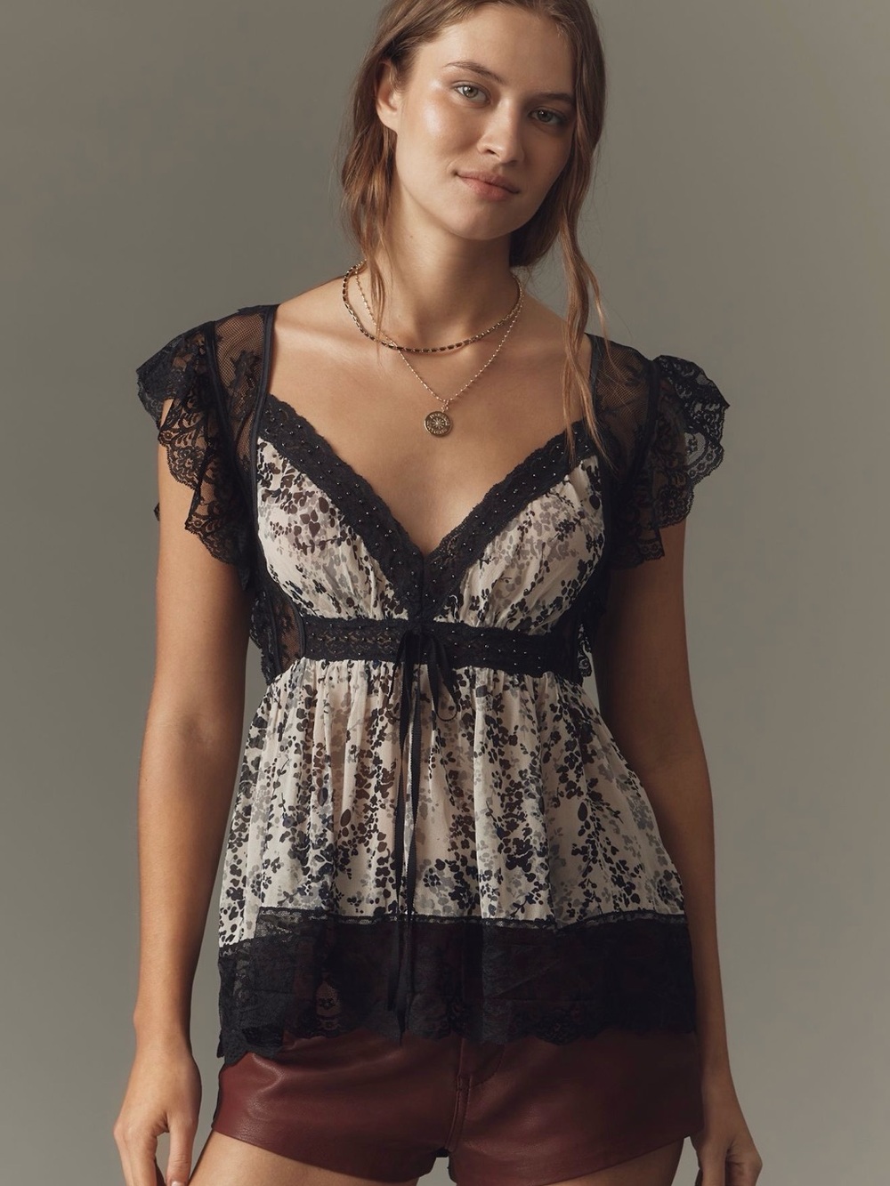 By Anthropologie Lace & Faux-
Leather Top
